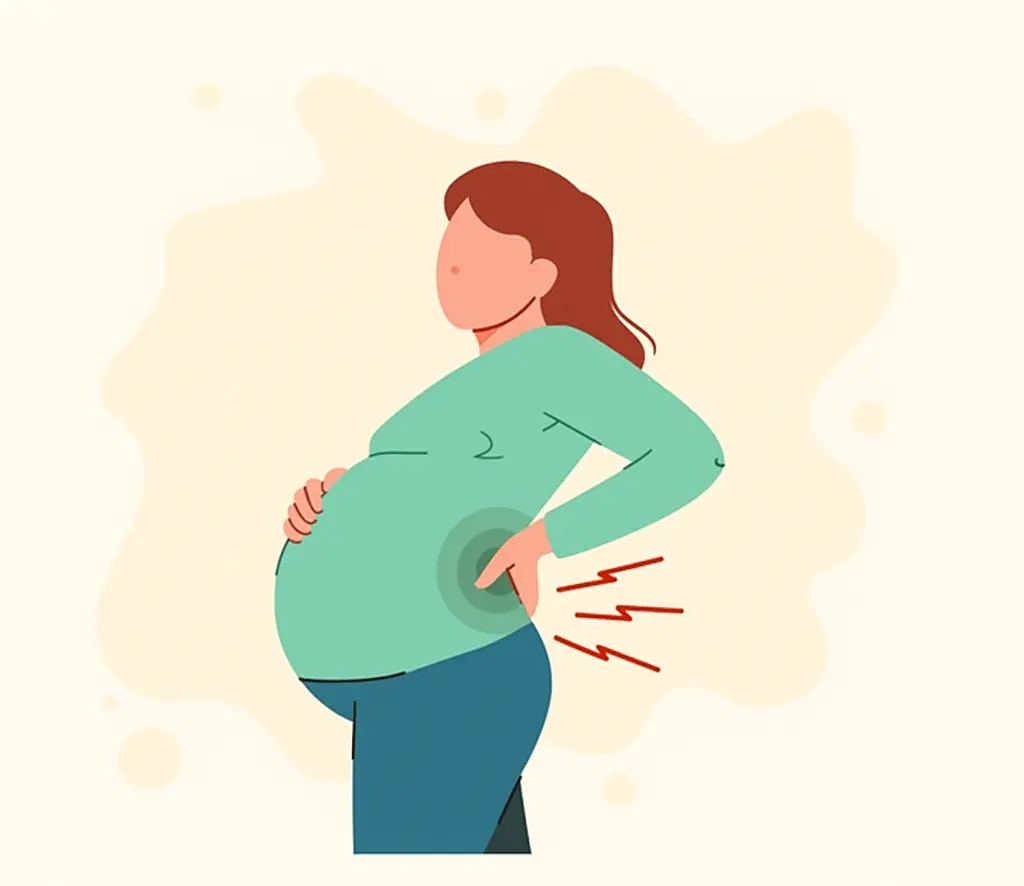 Woman experiencing back pain during pregnancy